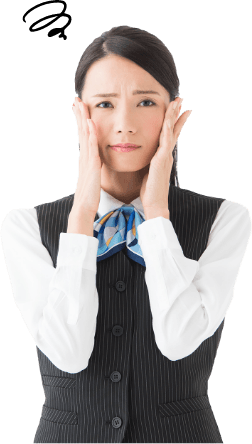 頭を抱える女性の写真